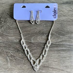 Claire’s costume diamond necklace and earrings.